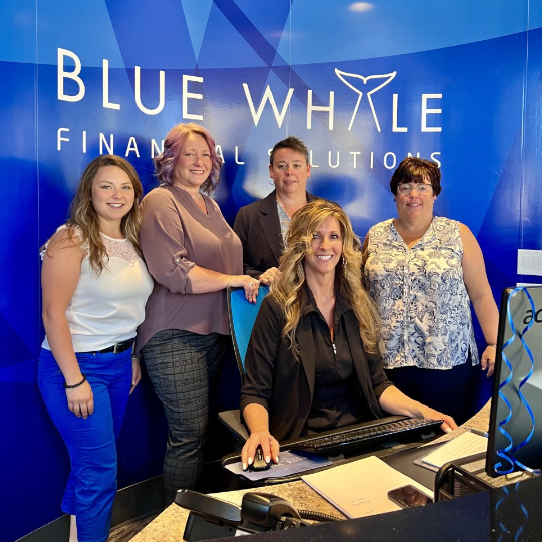 Team photo of five professional ladies at Blue Whale Financial Solutions Inc
