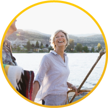 A woman smiling on a boat