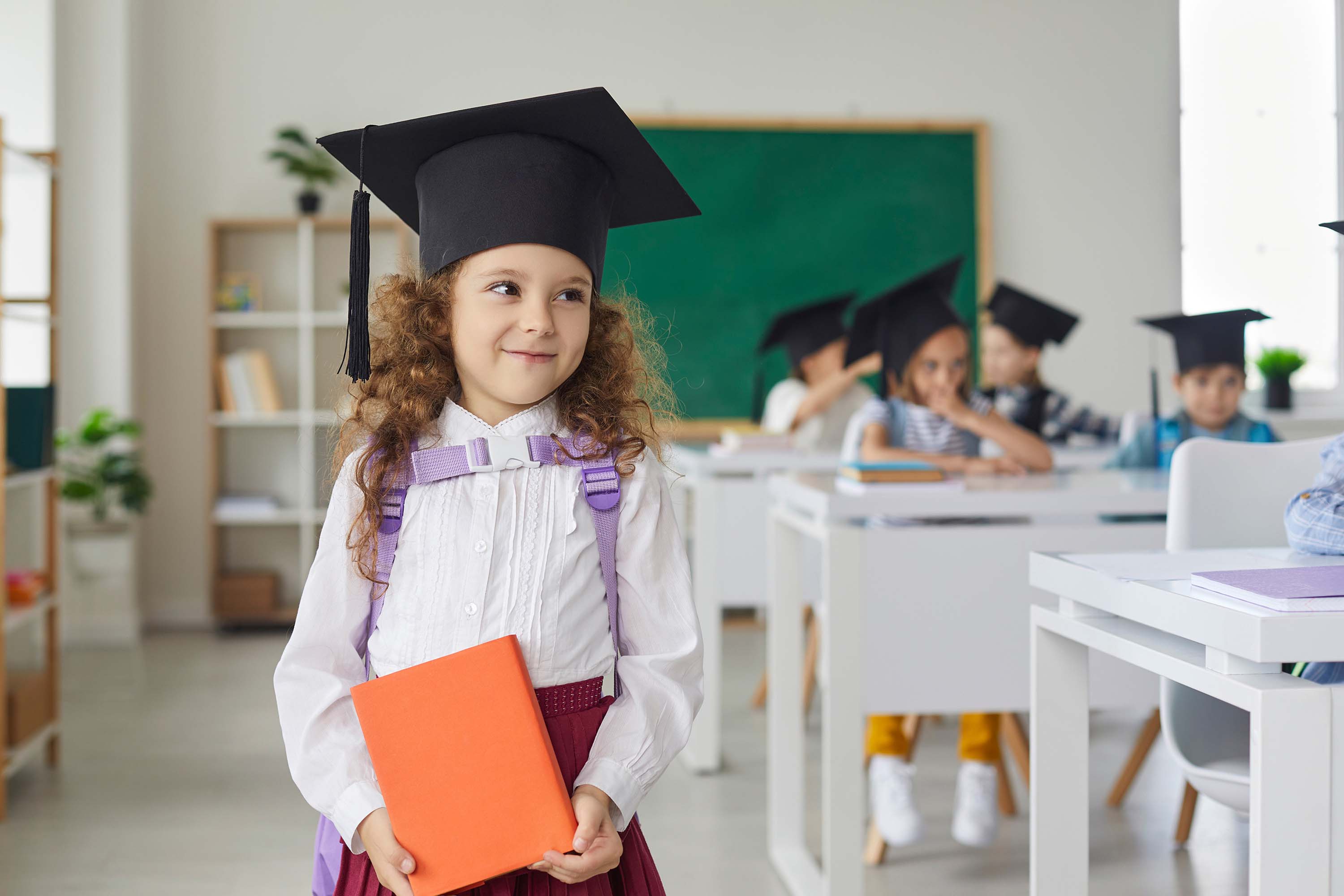 graduation picture of small girl