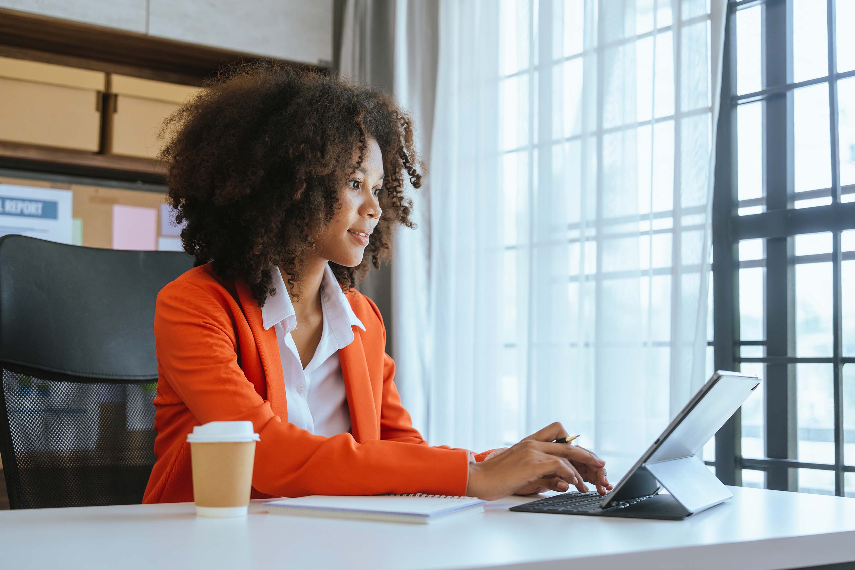 Woman is working on her laptop