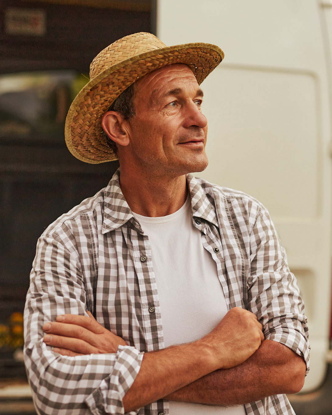 Man wearing straw hat