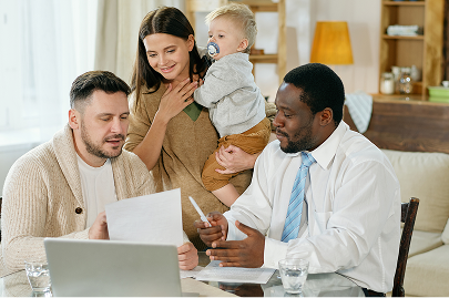 Financial advisor helping a family with financial planning