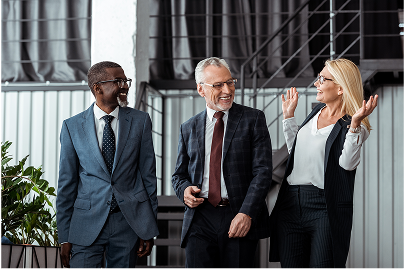 Business professionals walking together and discussing work